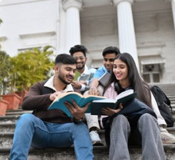 Students studying together on campus steps